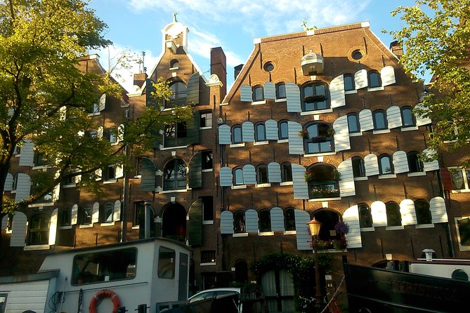 1,5 hours Amsterdam Rickshaw Tour - Reguliersgracht and the Seven Bridges