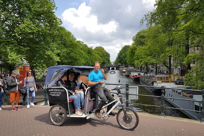 1,5 hours Amsterdam Rickshaw Tour - Nieuwmarkt and the old Waag