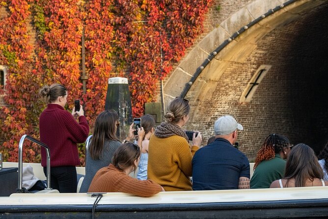 Amsterdam 1-Hour Canal Cruise With Live Guide - Churches and canal houses along the middle route