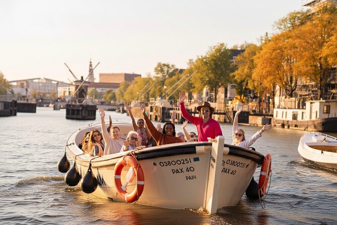 Amsterdam 1-Hour Canal Cruise With Live Guide - Markets, museums, and the return toward the canal ring