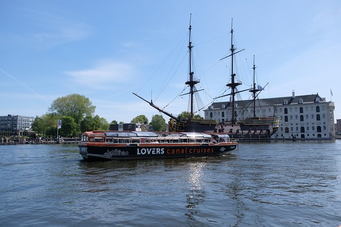 Amsterdam 1h Canal Cruise by Semi-Open Boat with Audio Guide - Hermitage Museum and the Golden Bend