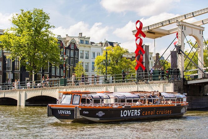 Amsterdam 1h Canal Cruise by Semi-Open Boat with Audio Guide - Merchant Houses and the Logic of Amsterdam’s Canals