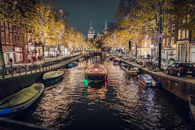 Amsterdam 2-Hour Evening Cruise With Live Guide and Bar - A small boat, a live guide, and a bar