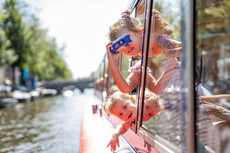 Amsterdam: 75 Minute City Canal Cruise with Audio Guide - Amsterdam Centraal, the IJ River, and modern architecture