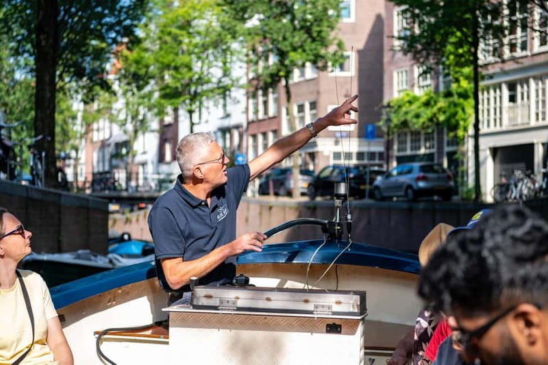 Amsterdam: 75 minute Open Boat Canal Cruise with Live Guide - Why the small boat changes the Amsterdam canal ride