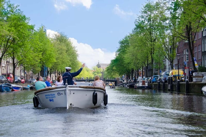 Amsterdam: 75 minute Open Boat Canal Cruise with Live Guide - From Stadhouderskade to Leidseplein