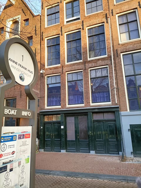 Amsterdam: Anne Frank Guided Small Group Walking Tour - De Silveren Spiegel and personal stories of life under occupation