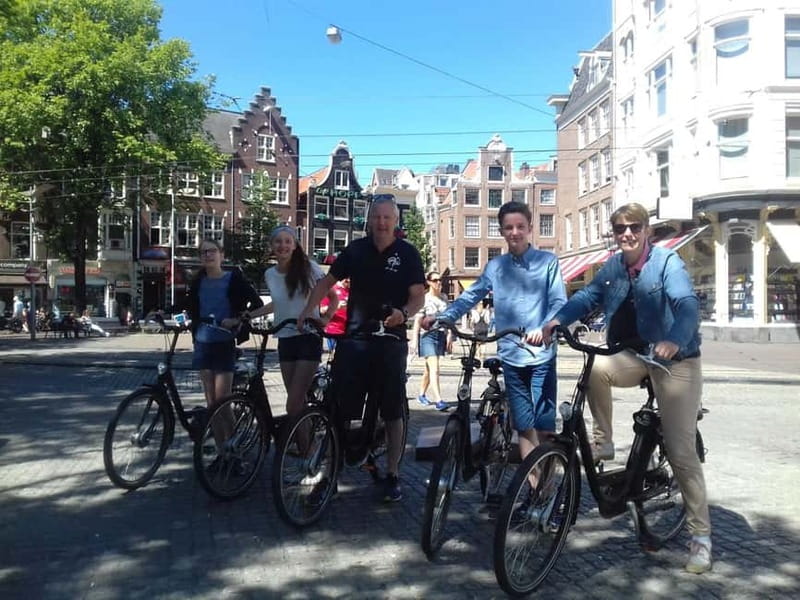 Amsterdam bike tour with a French-speaking guide local! - Dam Square and the historic center