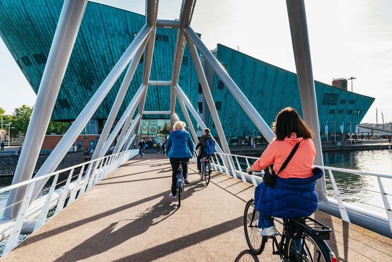 Amsterdam: Bike Tour with Optional Cruise in Small-Group - Artis and De Gooyer Windmill