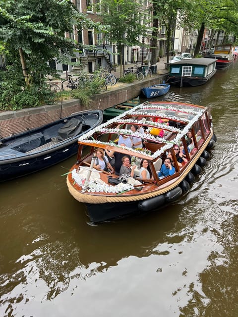 Amsterdam: Boat Tour with Optional Unlimited Drinks - Boarding the Enterprise near the Red Light District