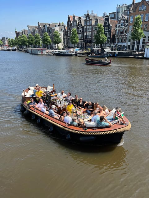 Amsterdam: Boat Tour with Optional Unlimited Drinks - Unlimited beer and wine, with a nightlife feel