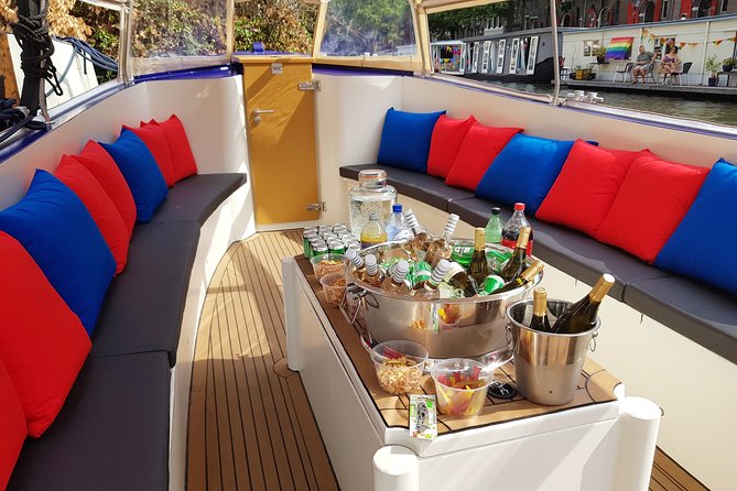 Amsterdam: Canal Booze Cruise with Unlimited Drinks Option - A canal cruise with a social bar atmosphere