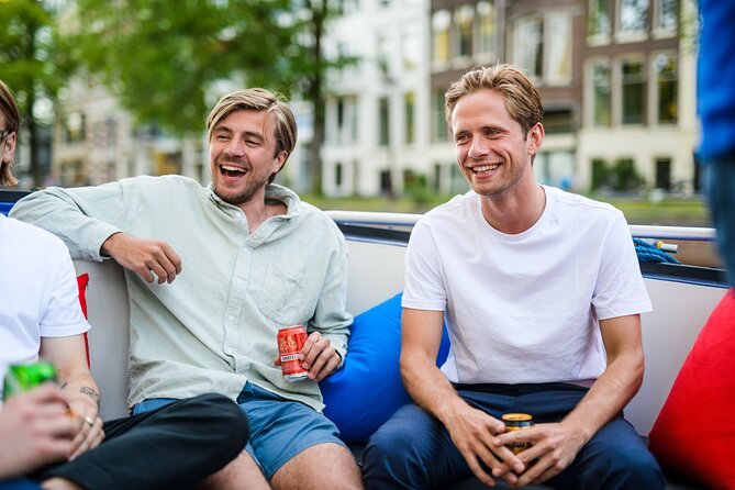 Amsterdam: Canal Booze Cruise with Unlimited Drinks Option - De Wallen and the two departure choices