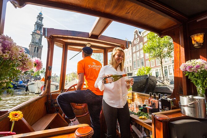 Amsterdam Canal Cruise in Classic Salon Boat With Drinks and Cheese - Settling into the classic salon boat