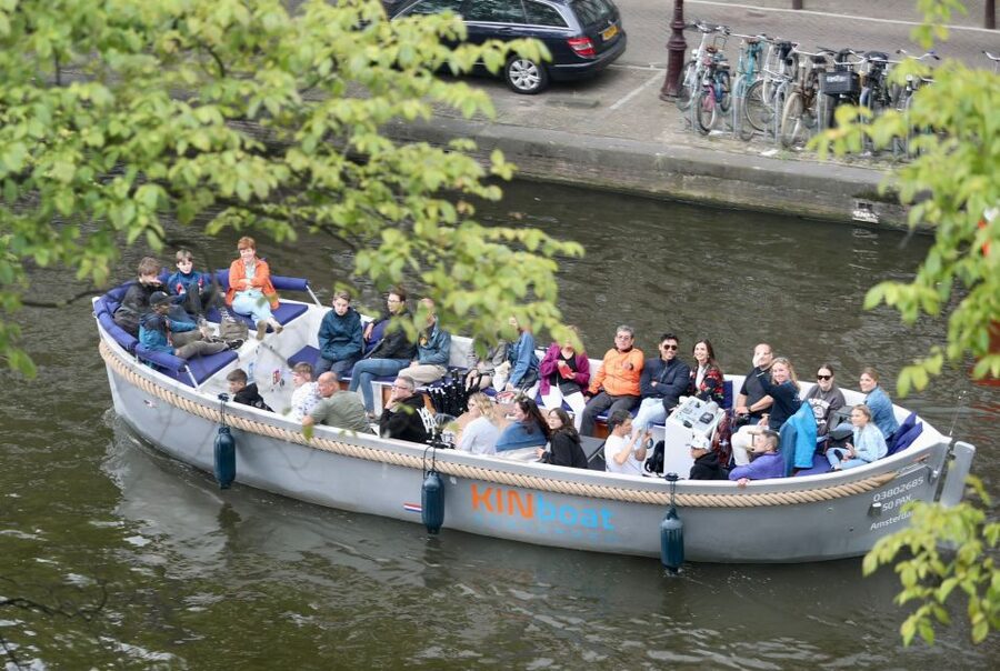 Amsterdam: Canal Cruise in Open Boat with Drink Option - The open-boat setup and drink option