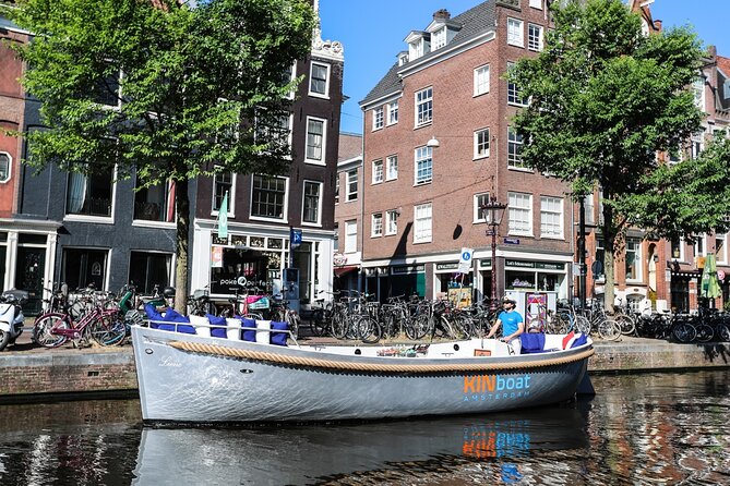 Amsterdam Canal Cruise in Open Boat with Unlimited Drinks Option - Open boat views, glass tops, and weather