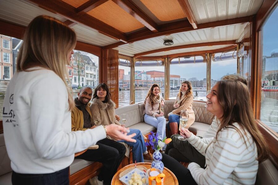 Amsterdam: Canal Cruise with Bubbles & Bites - Setting off through Amsterdam’s Golden Age canals
