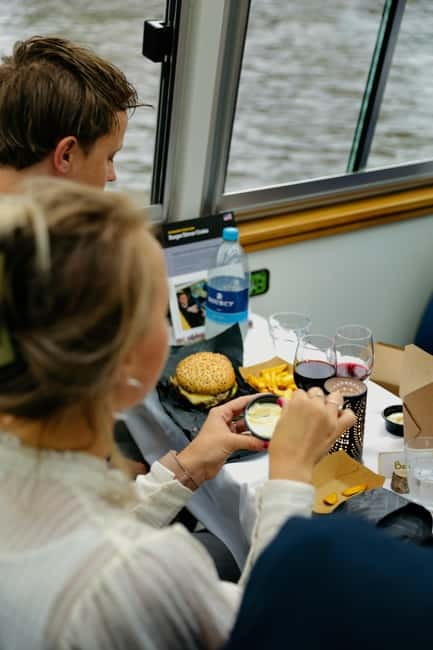 Amsterdam canal cruise with culinary burger or cheese & wine - Magere Brug and the central canal sights