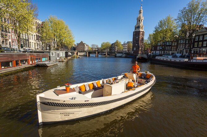Amsterdam Canal Cruise with German Guide and unlimited drinks - A small boat changes the experience