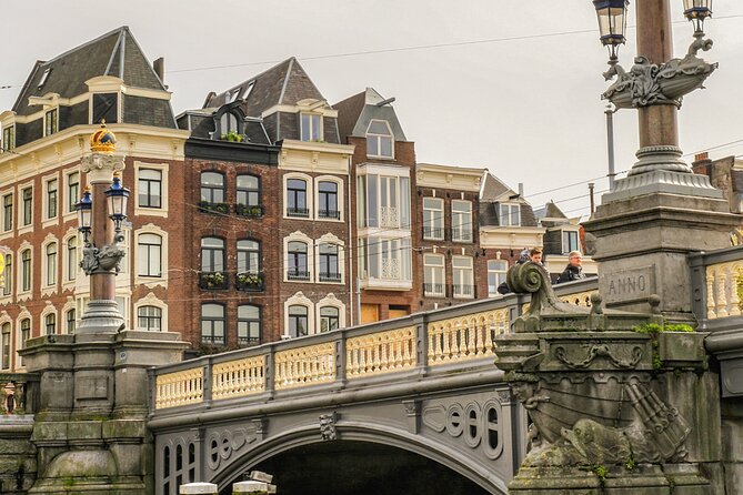 Amsterdam Canal Cruise with German Guide and unlimited drinks - Herengracht and the Seven Bridges
