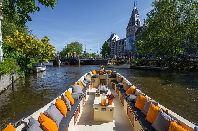 Amsterdam Canal Cruise with German Guide and unlimited drinks - The Love Bridge and the Hermitage