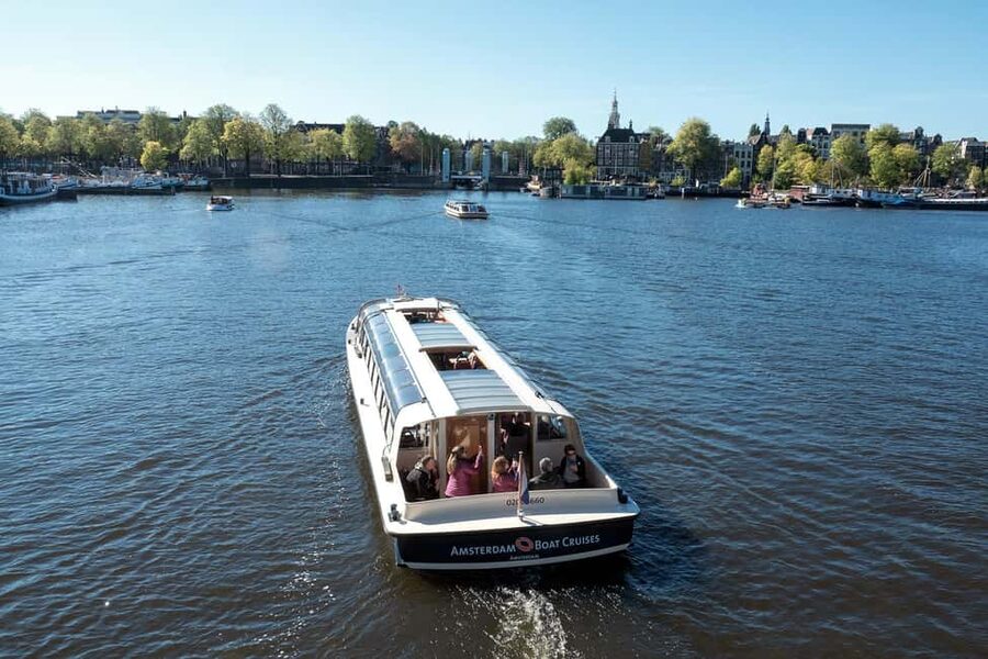 Amsterdam: Canal Cruise with Live Commentary & Audio Guide - From the IJ River into Amsterdam’s canal belt