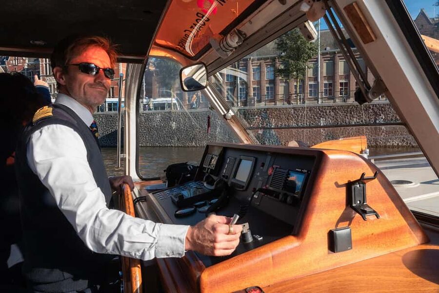 Amsterdam: Canal Cruise with Live Commentary & Audio Guide - Live commentary, audio guides, and the human touch