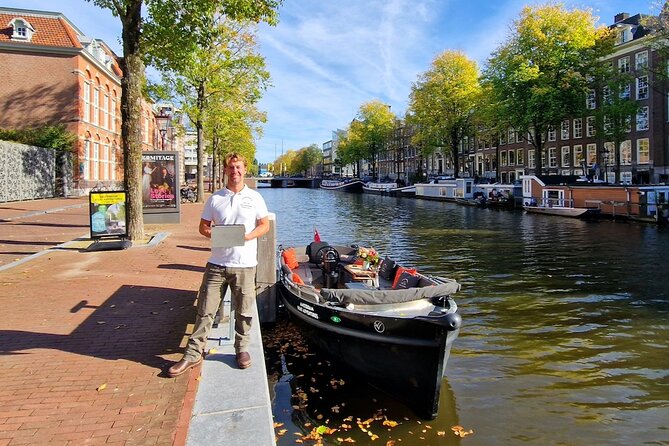 Amsterdam Canal Tour by Open Boat – 90 min Small Group Experience - The Old Church and Oudezijds Voorburgwal