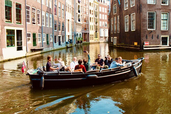 Amsterdam Canal Tour by Open Boat – 90 min Small Group Experience - Modern architecture and the quiet edge of a city park