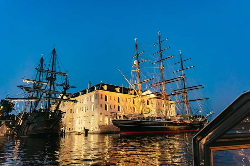 Amsterdam: Cheese & Wine Cruise Tasting Experience - Houseboats, canal houses, and the Maritime Museum