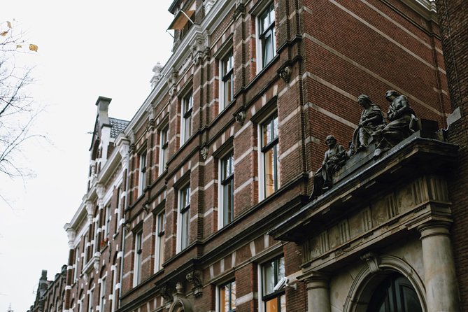 Amsterdam City Center Guided Walking Tour Semi-Private 12ppl Max - Ending at Papeneiland with a canal-side pause