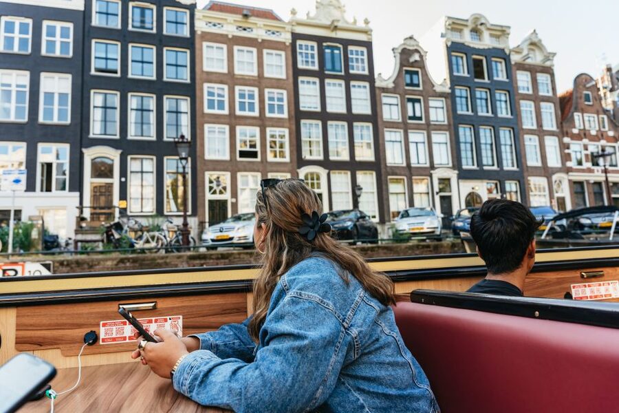 Amsterdam: City Centre Canal Cruise & Free Flower Cocktail - Bridges, warehouses, and the Magere Brug
