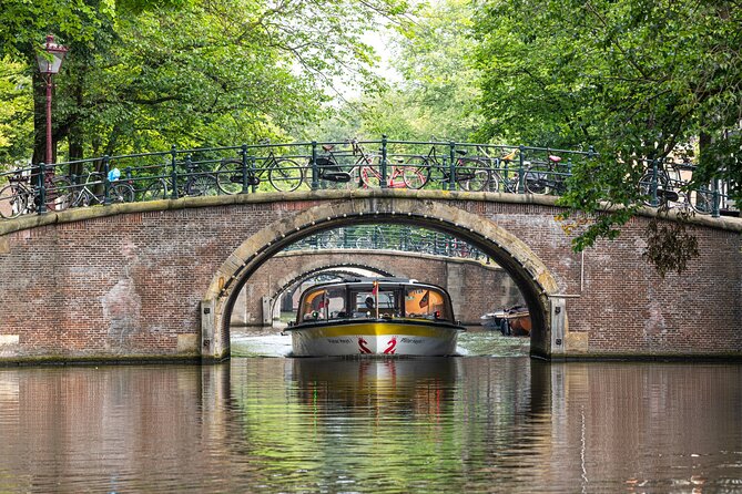 Amsterdam City Centre Cruise on heated boat with Audioguide - Comfort in rain, cold, and changing weather
