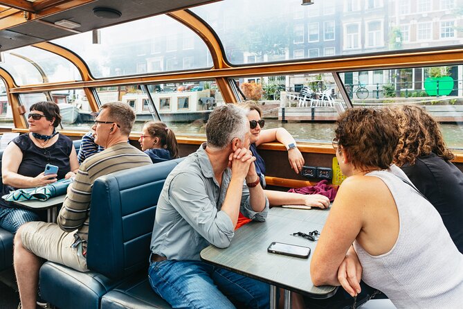 Amsterdam City Centre Cruise on heated boat with Audioguide - Centraal Station and Amsterdam’s first impression