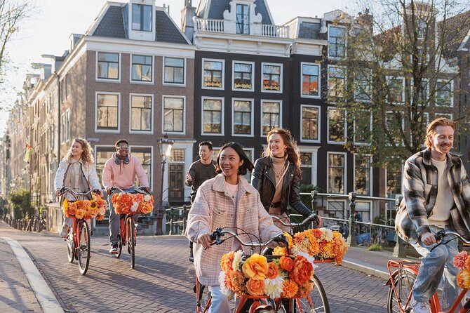 Amsterdam City Top Highlights Guided Bike Tour - Cafes, shops, and the oldest quarter