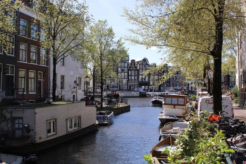 Amsterdam: City walking experience with a local - The 3 XXXs, bikes, and Amsterdam’s frank modern identity