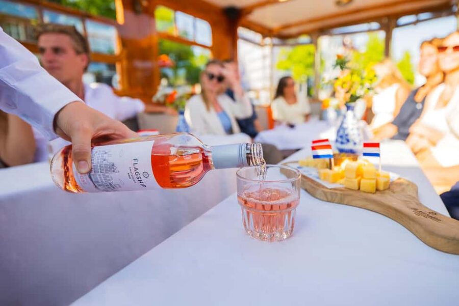 Amsterdam: Classic Boat Cruise with Optional Cheese & Wine - Meeting the crew and settling aboard
