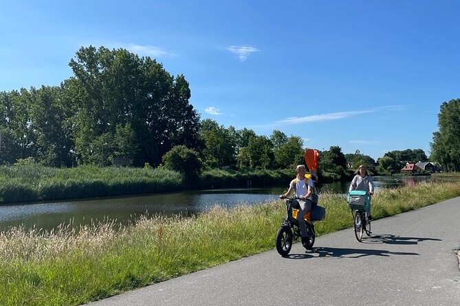 Amsterdam Countryside Bike and Kayak Tour - Crossing the canal by cable ferry