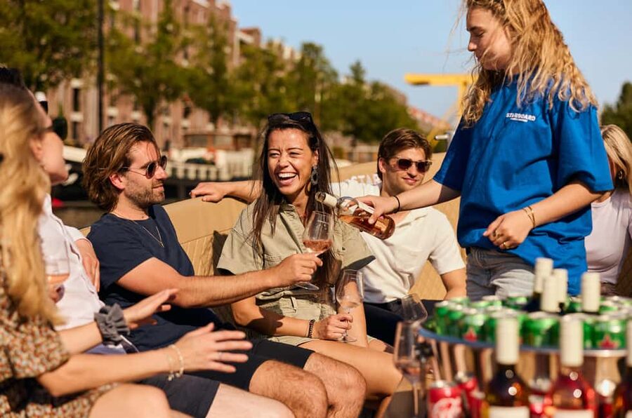Amsterdam: Cozy Evening Canal Cruise With Open Bar Option - Meeting near Dam Square and boarding at Oudezijds Voorburgwal 230