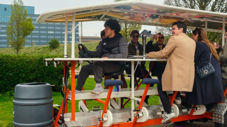 Amsterdam: Dutch Beer Bike Blast Tour with Onboard Bar - Sixty-five minutes through Sloterdijk