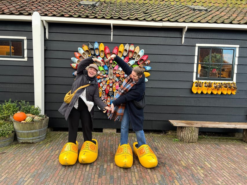 Amsterdam: Dutch Countryside E-Bike with Cheese & Clogs - Cheese, clogs, and a farmer with a sense of humor