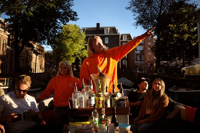 Amsterdam Evening Canal Cruise with Live Guide and Onboard Bar - Amstel views, the Skinny Bridge, and the Munttoren