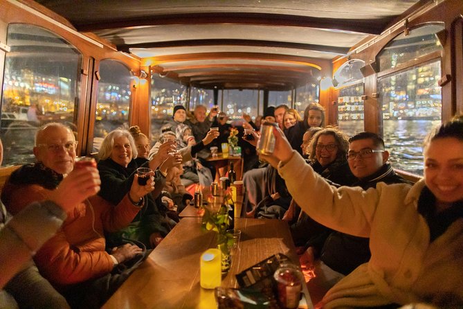 Amsterdam Evening Canal Cruise with Live Guide and Onboard Bar - Theater, opera, and the city after dark