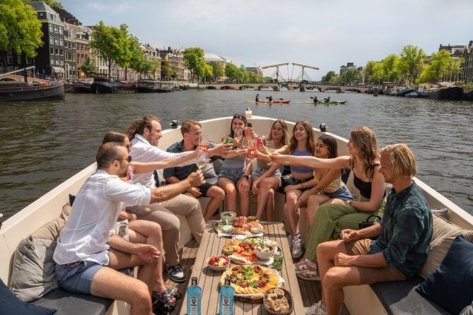 Amsterdam: Evening Candle Light Cruise With Wine & Cheese - Starting near Oudezijds Voorburgwal and the Red Light District