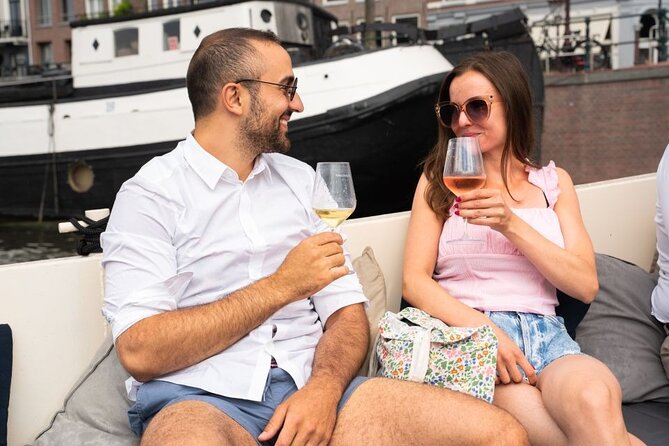 Amsterdam: Evening Candle Light Cruise With Wine & Cheese - Sea Palace, NEMO, and Amsterdam’s modern waterfront