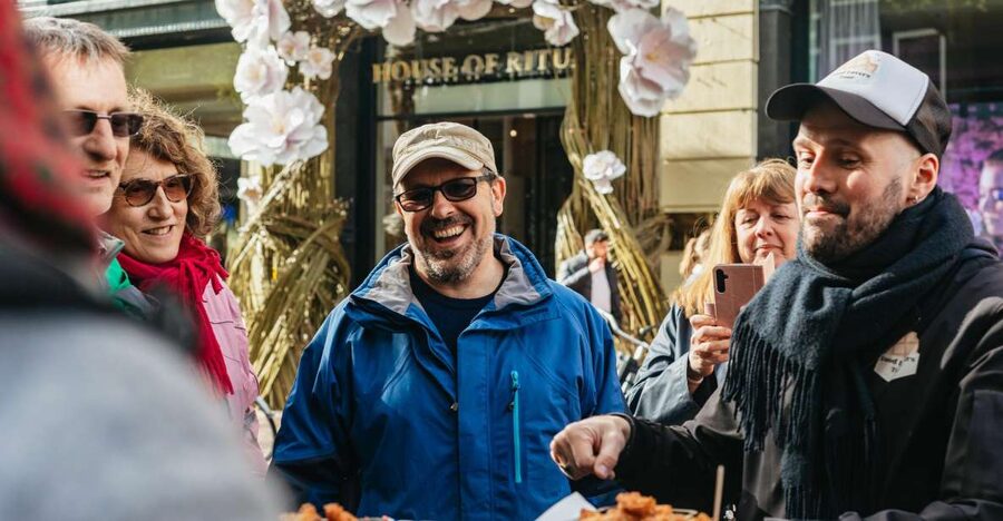 Amsterdam: Food and Culture Walking Tour with Tastings - Meeting at Vijzelstraat and entering the Flower Market