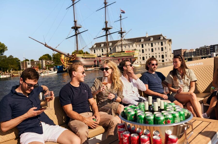 Amsterdam: German Guided Canal Cruise with on Board Bar - Maritime Amsterdam and Montelbaanstoren