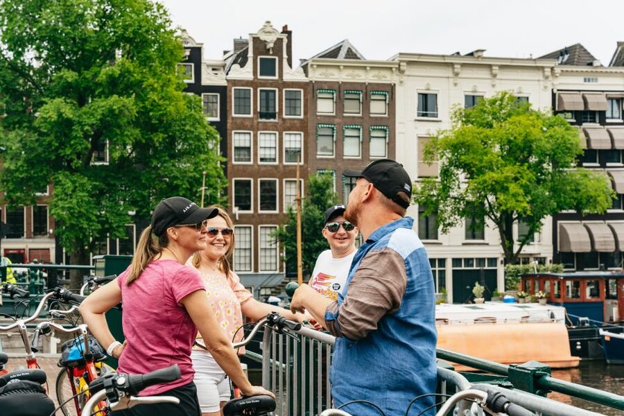 Amsterdam: Guided Bike Tour City Centre in EN/DE/FR/ES - Artis, the Maritime Quarter, and the ship at Salt Harbour
