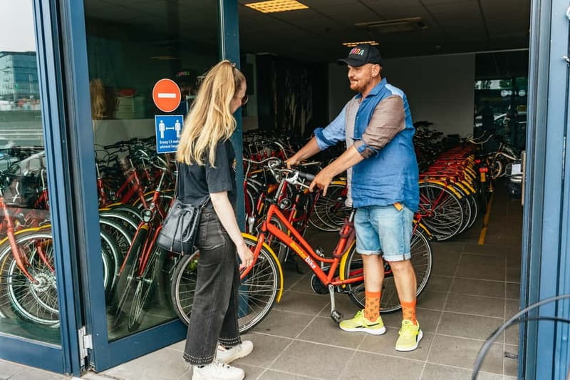 Amsterdam: Guided Bike Tour City Centre in EN/DE/FR/ES - Guides, group size, and the feel of the ride