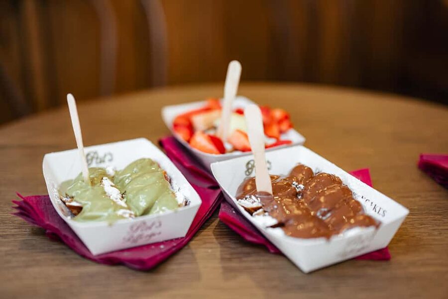 Amsterdam: Guided Cultural Food Tour in German or English - Damrak and Beurs van Berlage: trade shaped the city